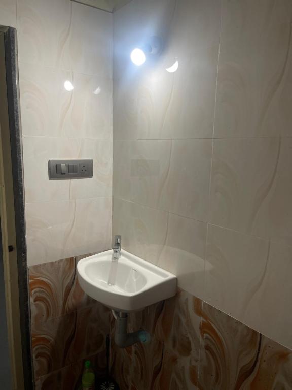 Koupelna v ubytování Skyview homestay Devaramane
