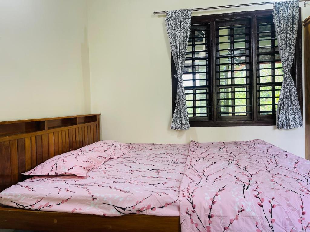 Postel nebo postele na pokoji v ubytování Skyview homestay Devaramane