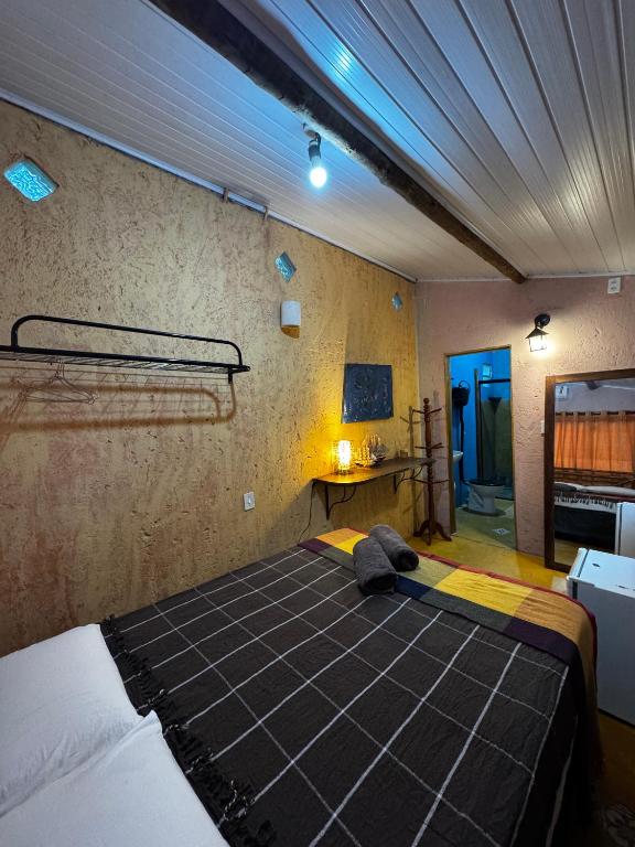 Postel nebo postele na pokoji v ubytování Chalé Orion