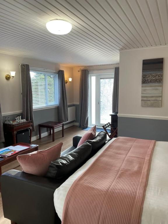 Letto o letti in una camera di The Claymore Guest House