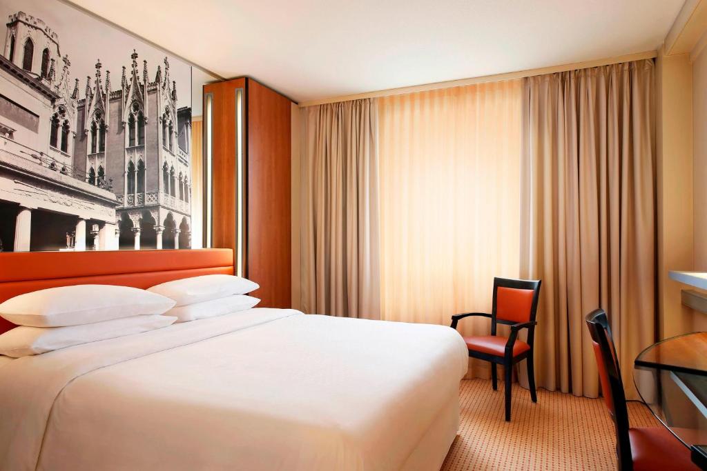 Postel nebo postele na pokoji v ubytování Four Points by Sheraton Padova