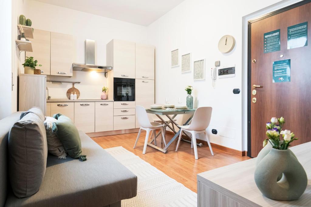 Kuchyňa alebo kuchynka v ubytovaní Cozy apartament in Piazza 5 Giornate by Easylife
