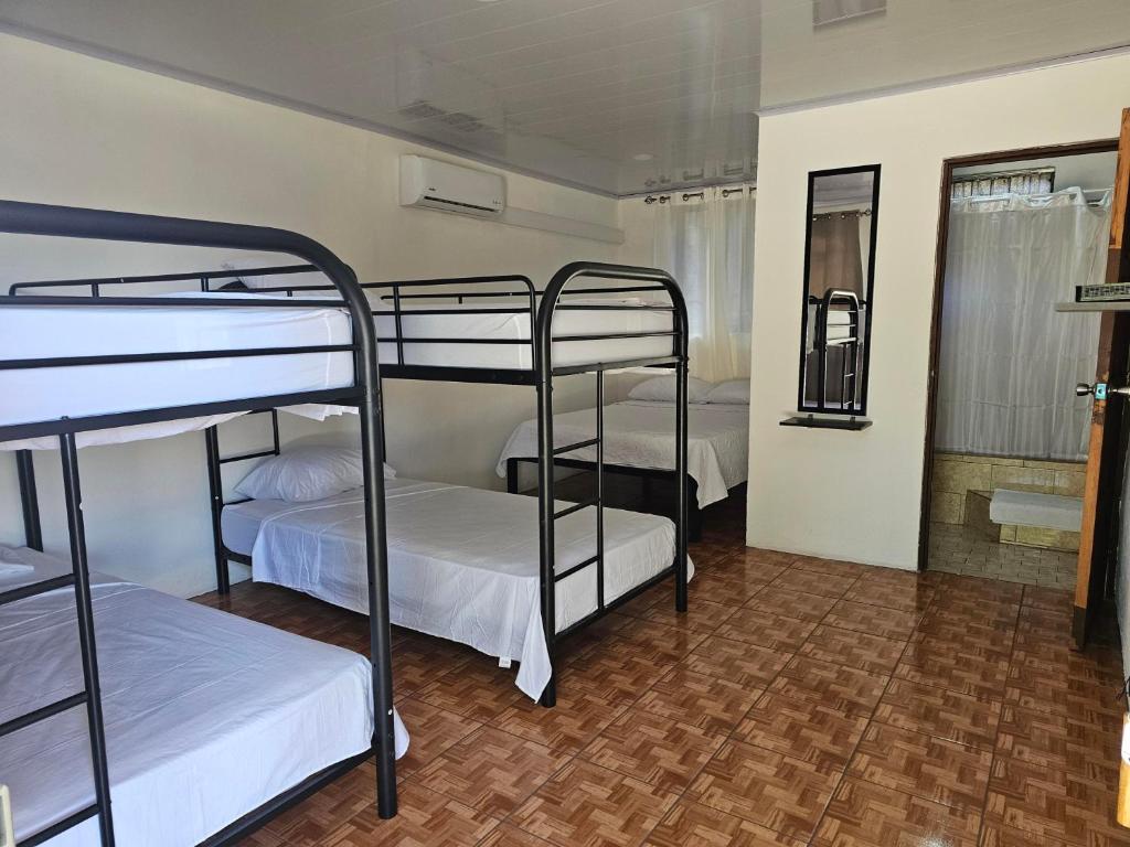 Postel nebo postele na pokoji v ubytování Hotel Luna Liberiana