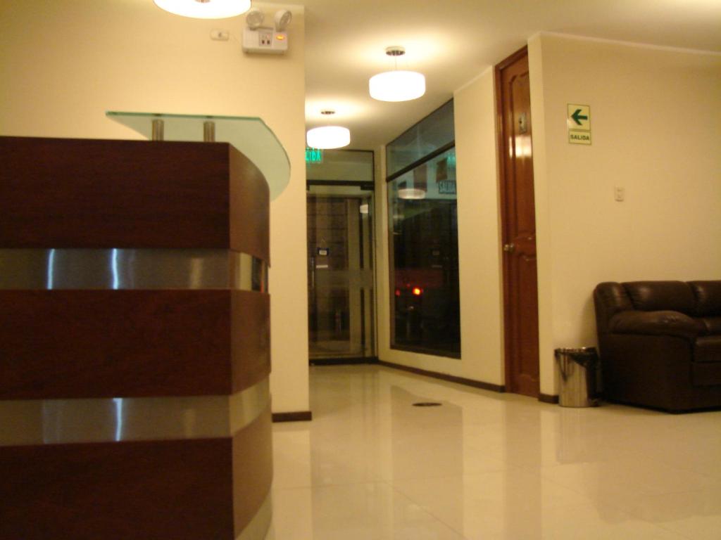 Posezení v ubytování Hostal Qoyllurwasi