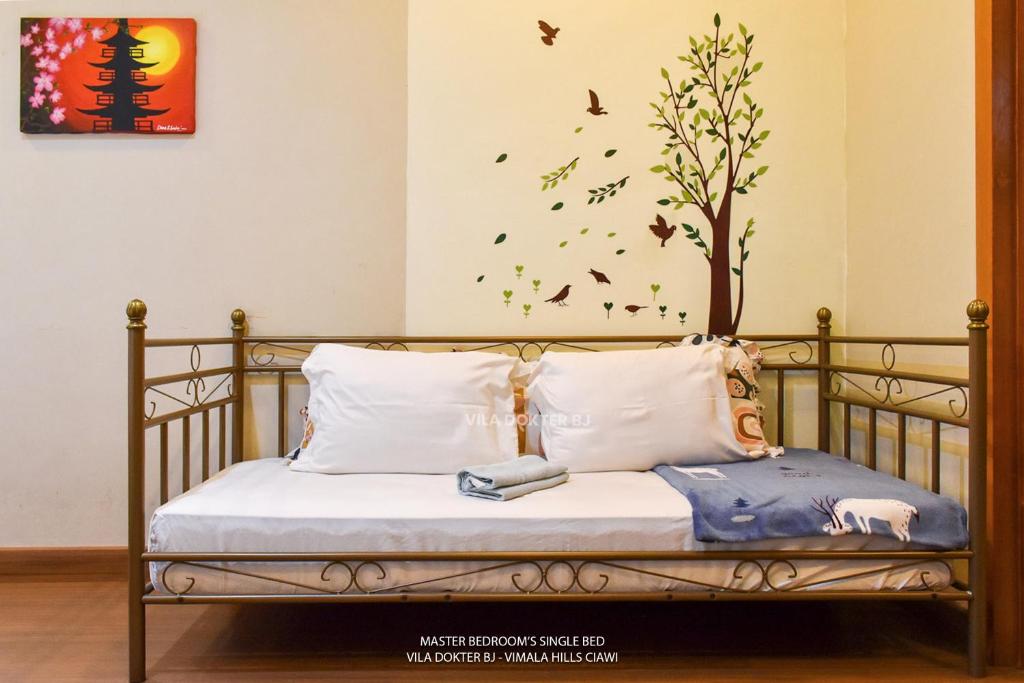 Postel nebo postele na pokoji v ubytování Vimala Hills Villa & Resort
