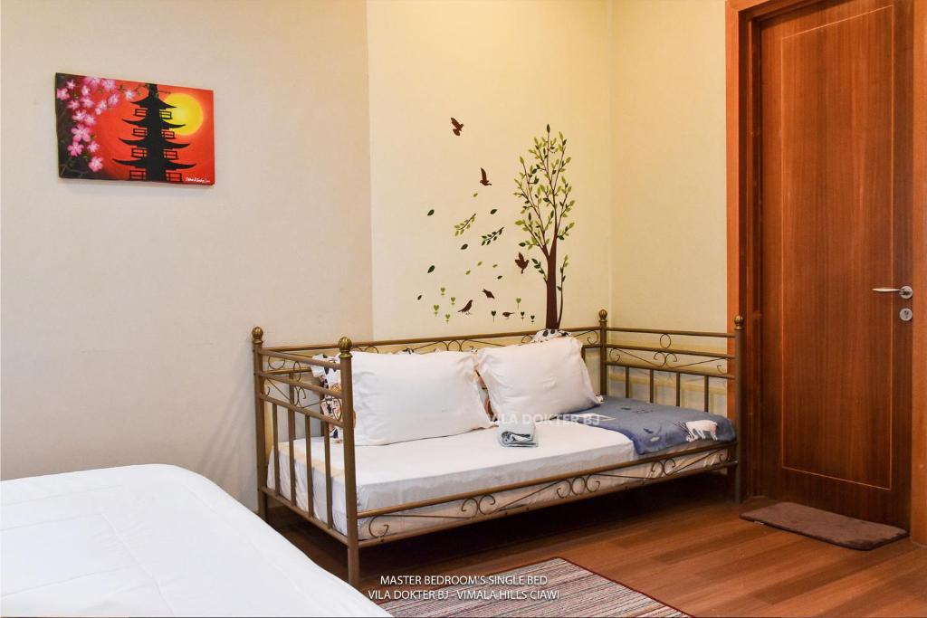 Postel nebo postele na pokoji v ubytování Vimala Hills Villa & Resort