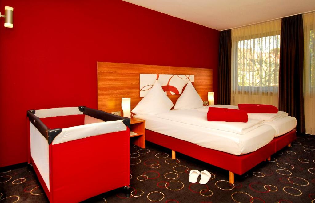 Postel nebo postele na pokoji v ubytování Hotel Central