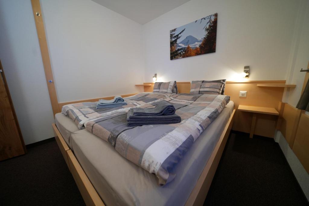 Postel nebo postele na pokoji v ubytování Haus Aida