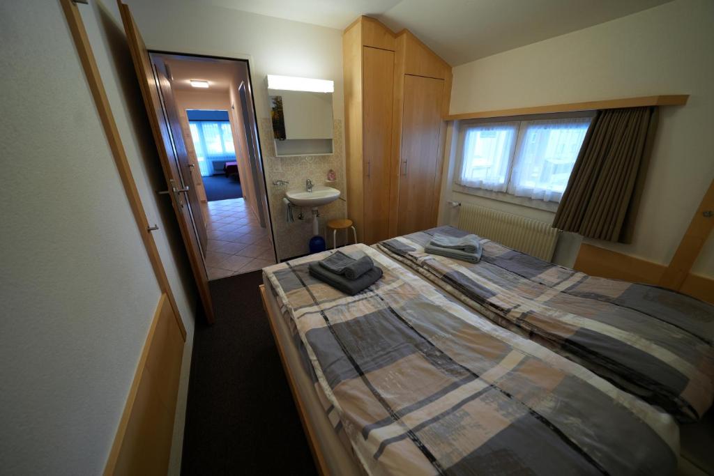Postel nebo postele na pokoji v ubytování Haus Aida