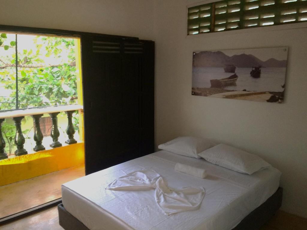 Postel nebo postele na pokoji v ubytování Villa Mary Hostel