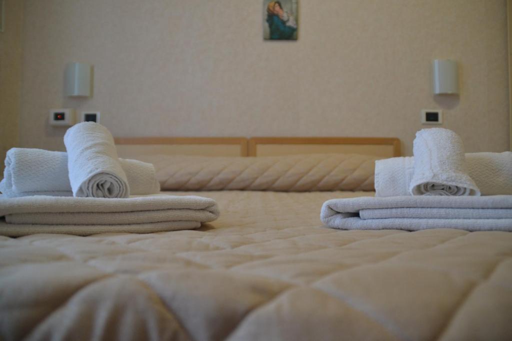 Postel nebo postele na pokoji v ubytování Hotel Bel Sogno