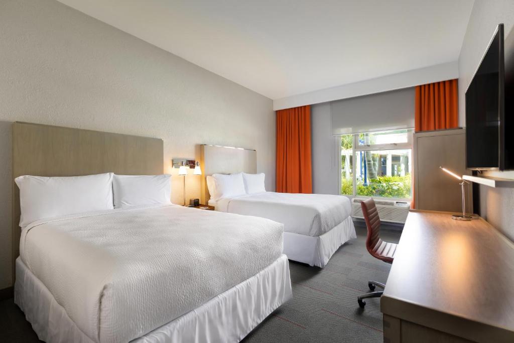 Postel nebo postele na pokoji v ubytování Four Points by Sheraton Caguas Real