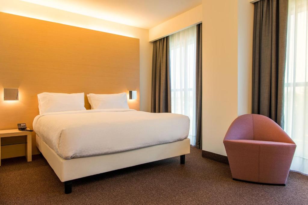 Postel nebo postele na pokoji v ubytování Four Points by Sheraton Venice Mestre
