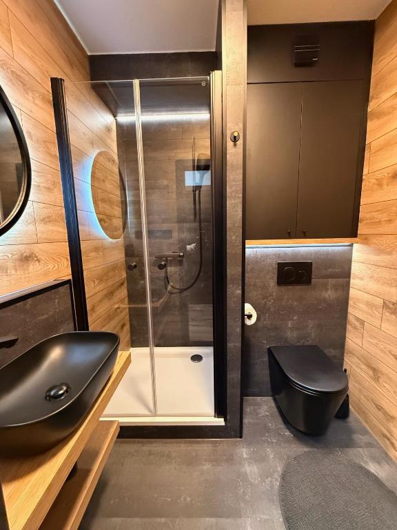 Koupelna v ubytování Apartmány KAMZÍK Donovaly