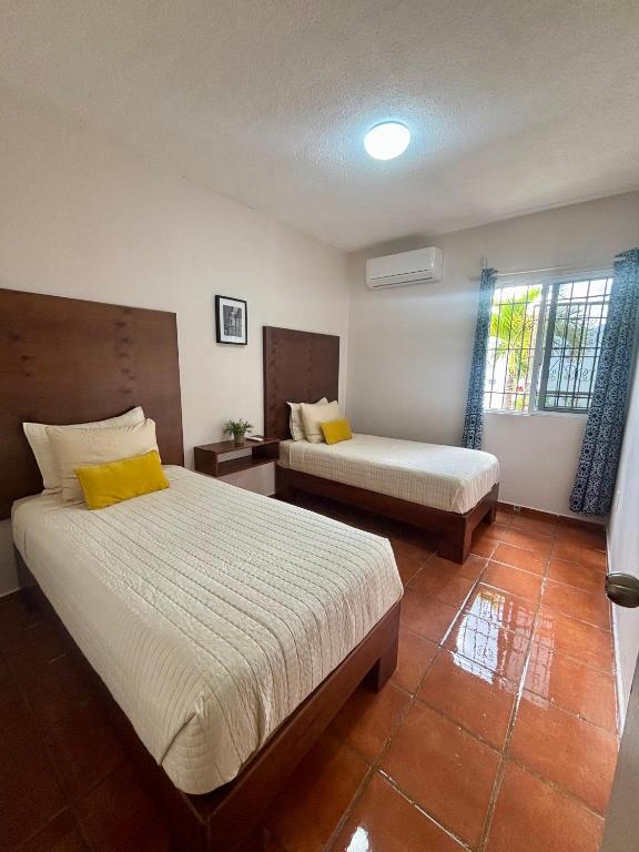 Postel nebo postele na pokoji v ubytování Casa Las Palmas, comfort and privacy