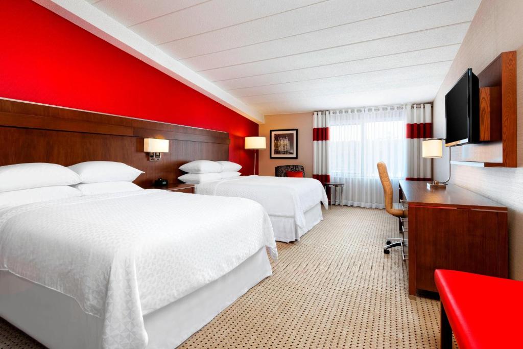 Postel nebo postele na pokoji v ubytování Four Points by Sheraton London