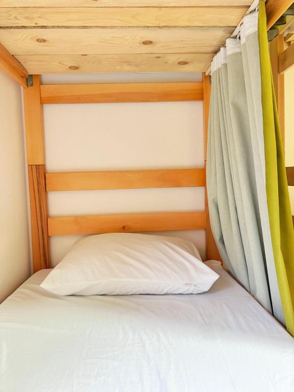 Postel nebo postele na pokoji v ubytování Eleven Hostel