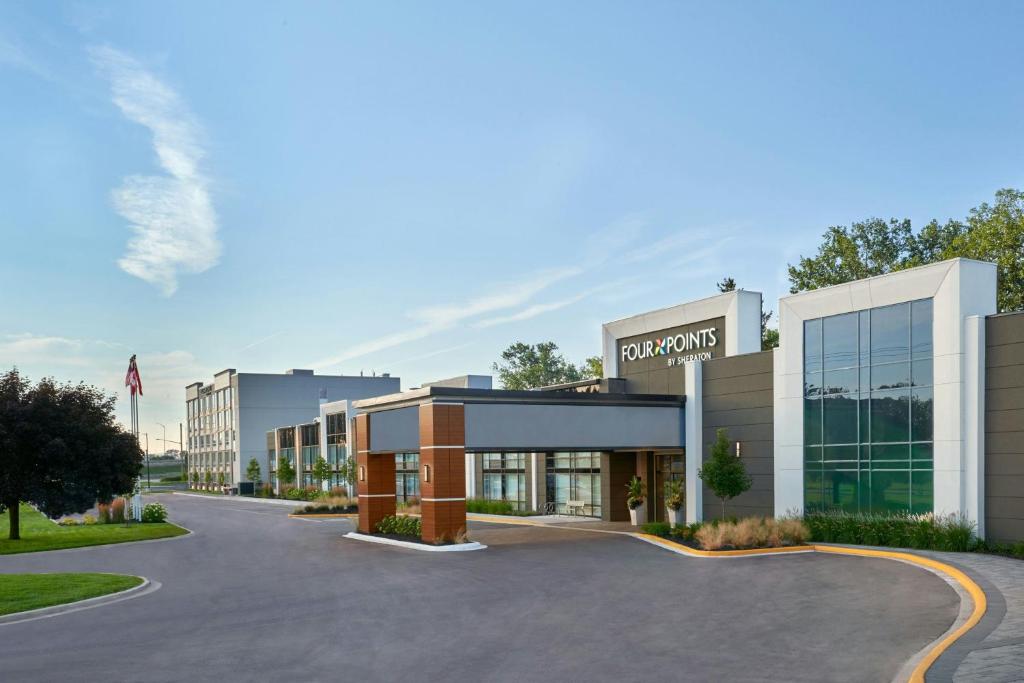 a rendering of the front of a hotel at Four Points by Sheraton Point Edward Sarnia in Sarnia