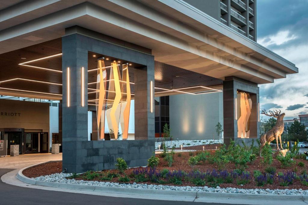 a building with a giraffe statue in front of it at Denver Marriott Tech Center in Greenwood Village