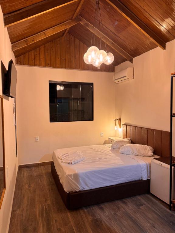 Katil atau katil-katil dalam bilik di Pousada Recanto do Canário Suite 3 Standart