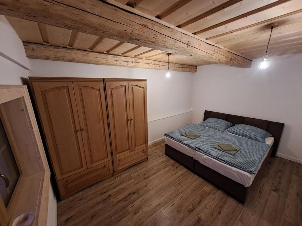 Postel nebo postele na pokoji v ubytování Apartmán Drevenica