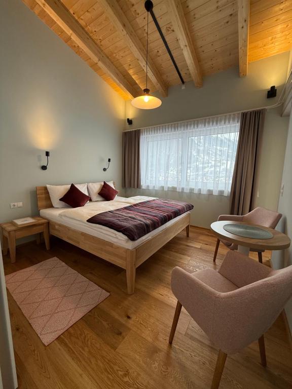 Postel nebo postele na pokoji v ubytování Das Muggla