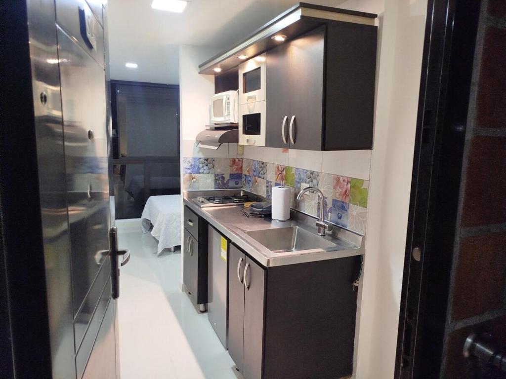 Kuchyň nebo kuchyňský kout v ubytování Apartamento en Belén