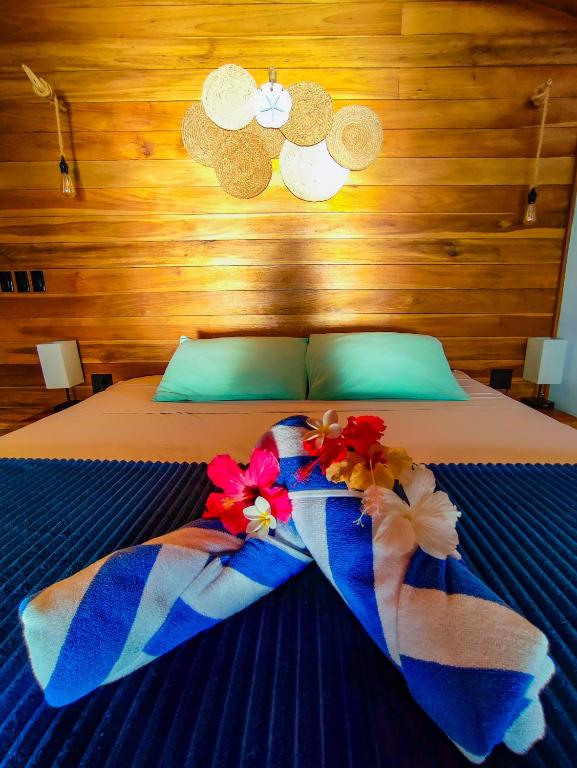 Postel nebo postele na pokoji v ubytování Bahia Coral Lodge