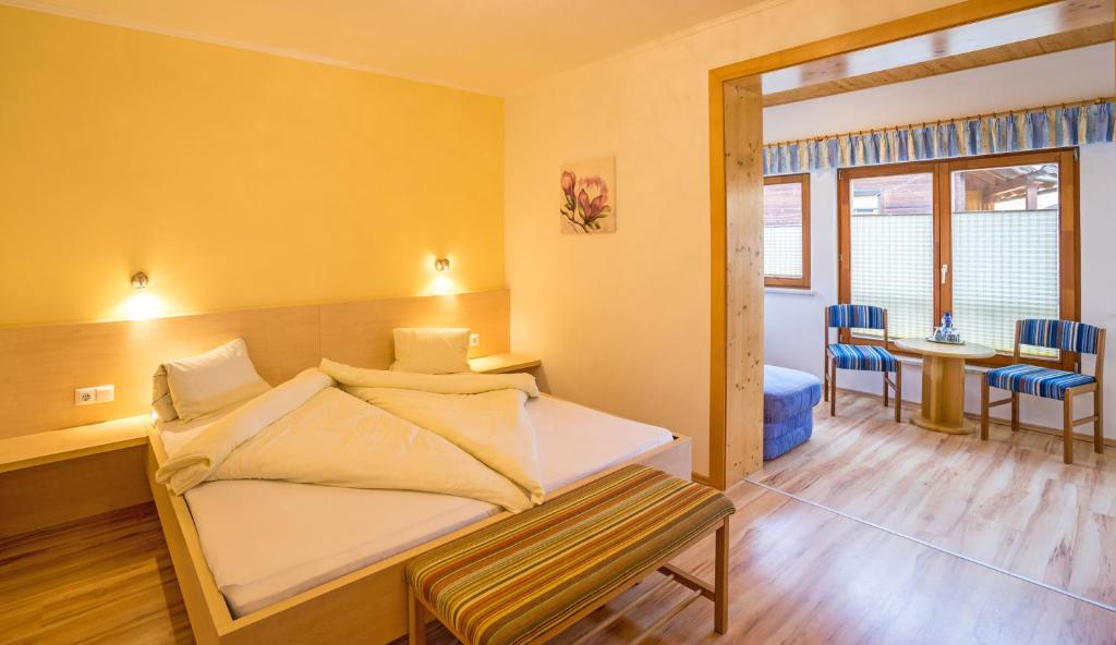 Postel nebo postele na pokoji v ubytování Haus Stampfer