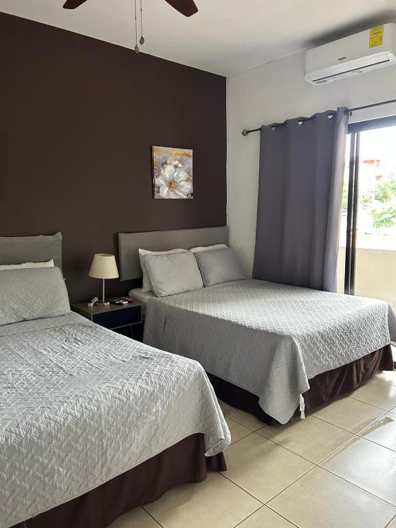 Postel nebo postele na pokoji v ubytování Casa Sur