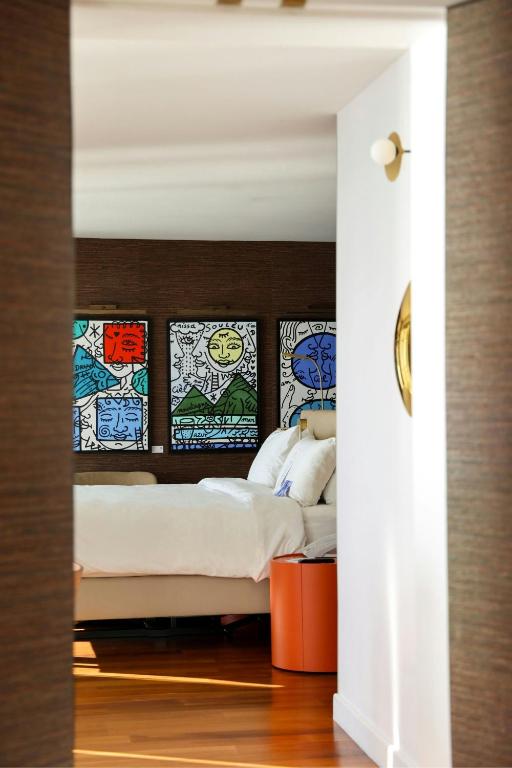Postel nebo postele na pokoji v ubytování Le Meridien Nice