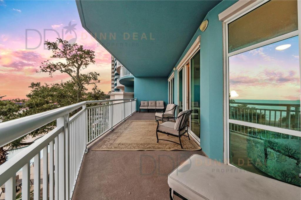 a balcony with a view of the ocean at Legacy Tower I 302 in Gulfport