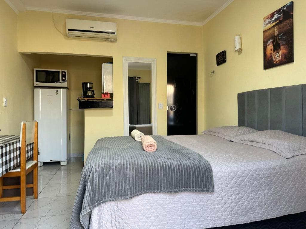 Postel nebo postele na pokoji v ubytování Capim de ouro Quartos Mobiliados a minutos do aeroporto