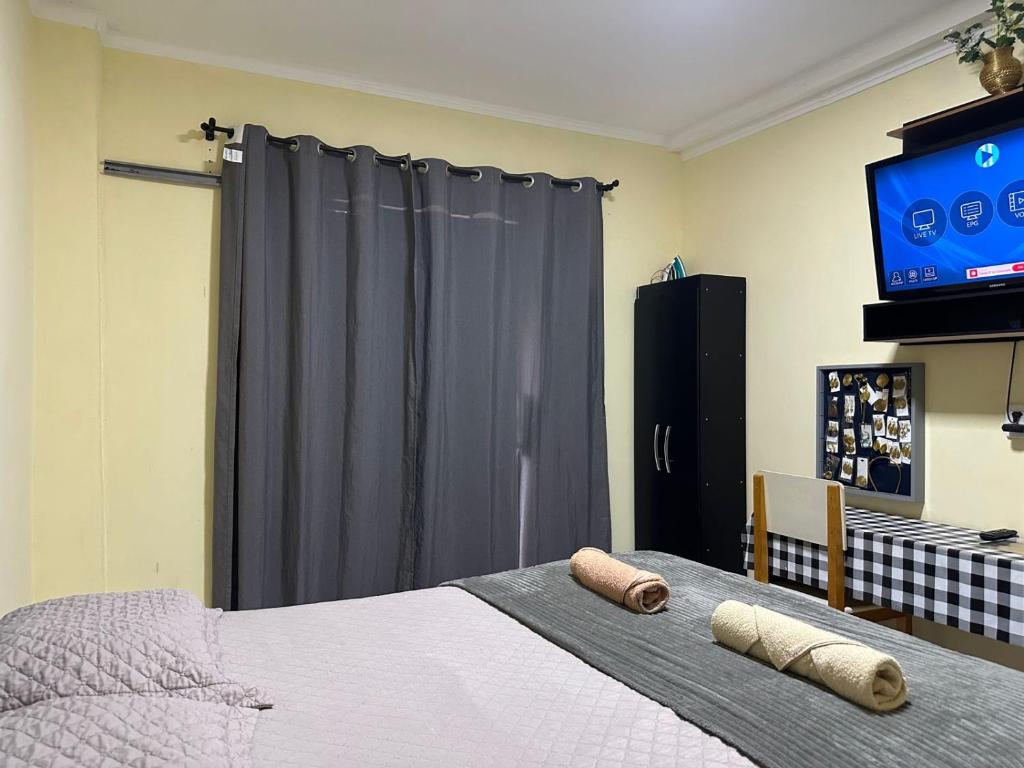 Postel nebo postele na pokoji v ubytování Capim de ouro Quartos Mobiliados a minutos do aeroporto