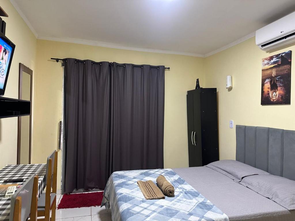 Postel nebo postele na pokoji v ubytování Capim de ouro Quartos Mobiliados a minutos do aeroporto