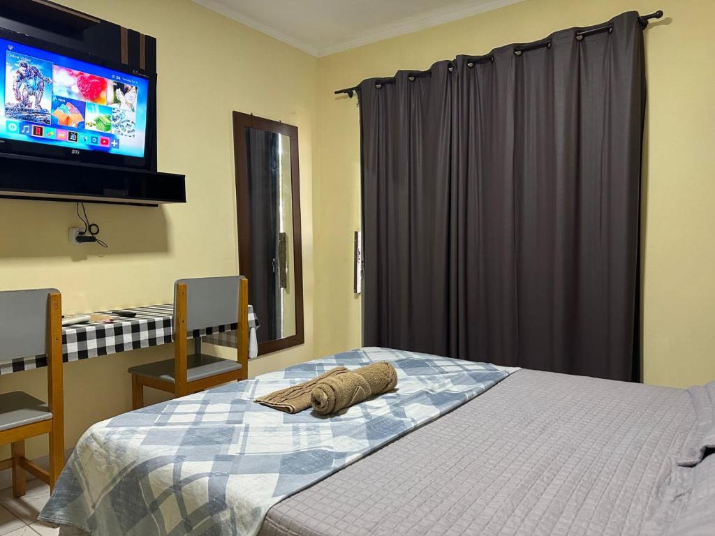 Postel nebo postele na pokoji v ubytování Capim de ouro Quartos Mobiliados a minutos do aeroporto