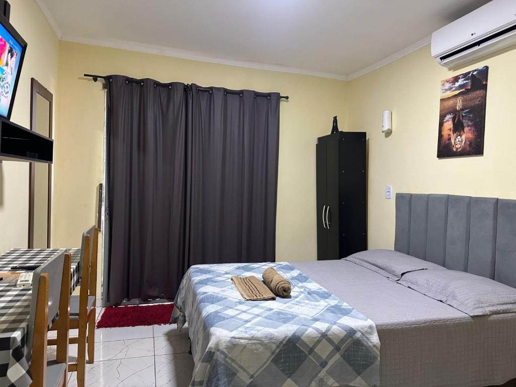 Postel nebo postele na pokoji v ubytování Capim de ouro Quartos Mobiliados a minutos do aeroporto