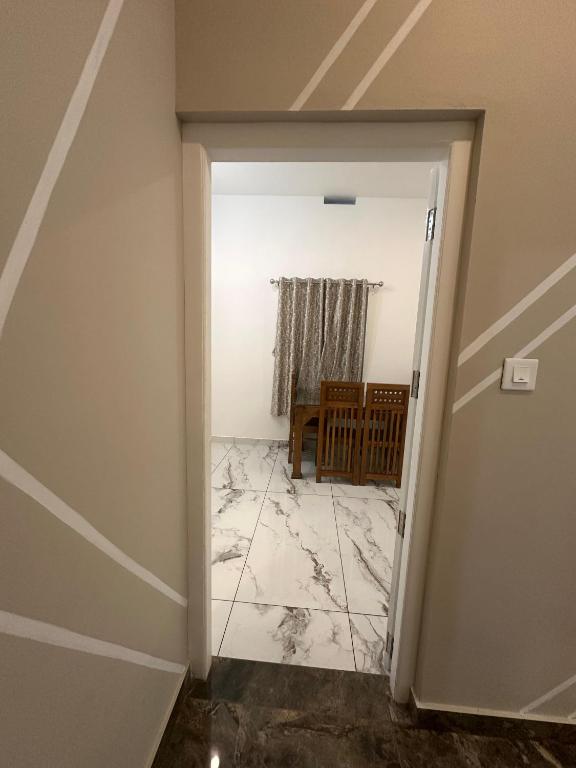 Fotografie z fotogalerie ubytování Homie Hub v destinaci Meppādi