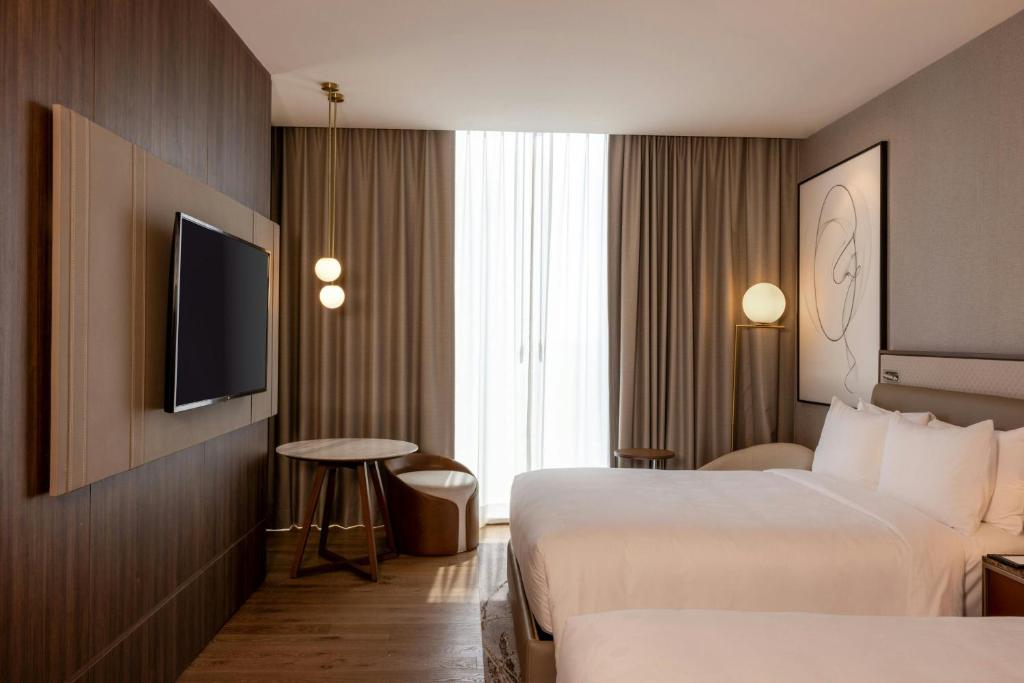 Postel nebo postele na pokoji v ubytování JW Marriott Hotel Guadalajara