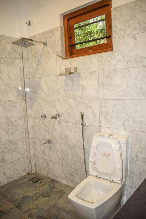 Koupelna v ubytování Nord Mirissa