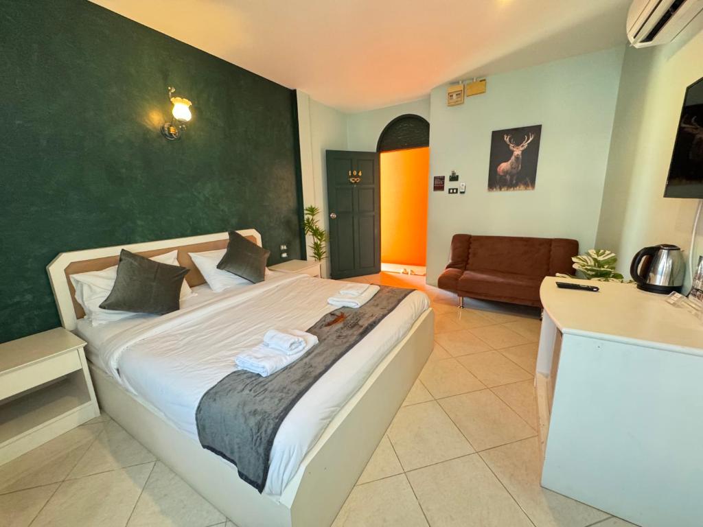 Postel nebo postele na pokoji v ubytování Venice Hotel Hua Hin