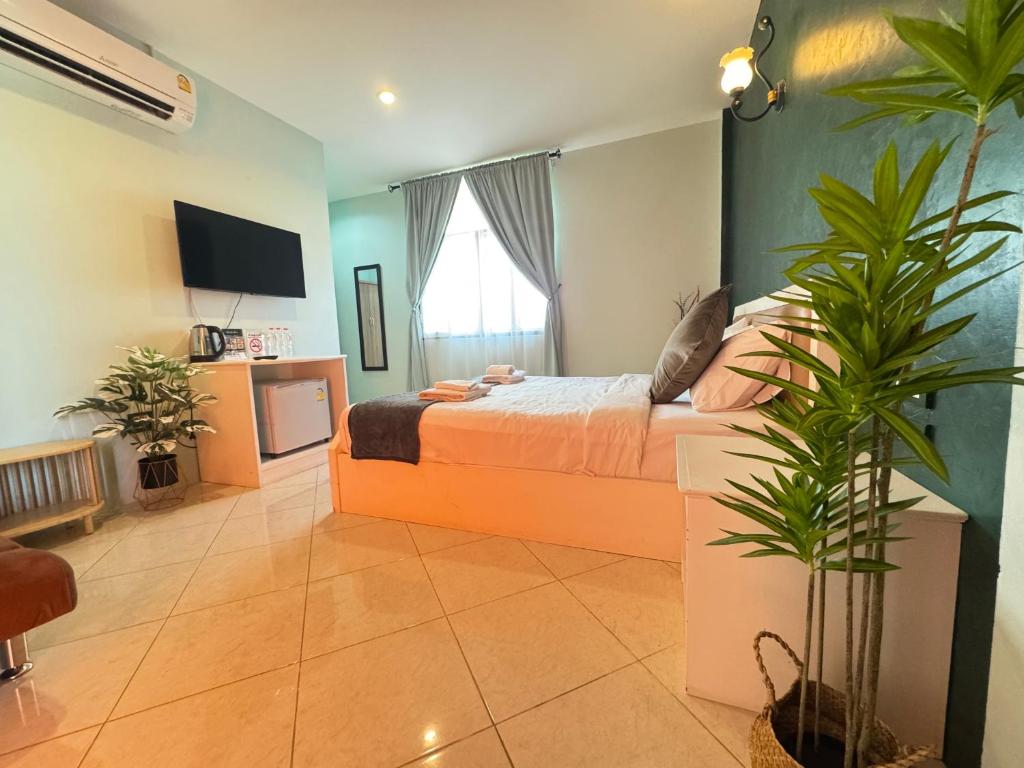 TV a/nebo společenská místnost v ubytování Venice Hotel Hua Hin