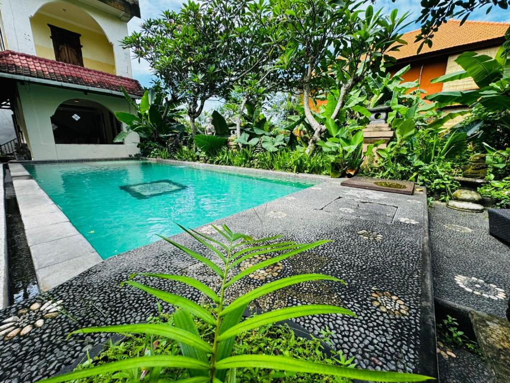 Bazén v ubytování Ubud Kerta Prashati nebo v jeho okolí