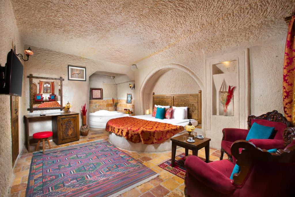 Postel nebo postele na pokoji v ubytování Garden Inn Cappadocia