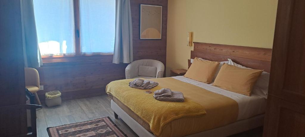 Postel nebo postele na pokoji v ubytování lo Miete di Nonni