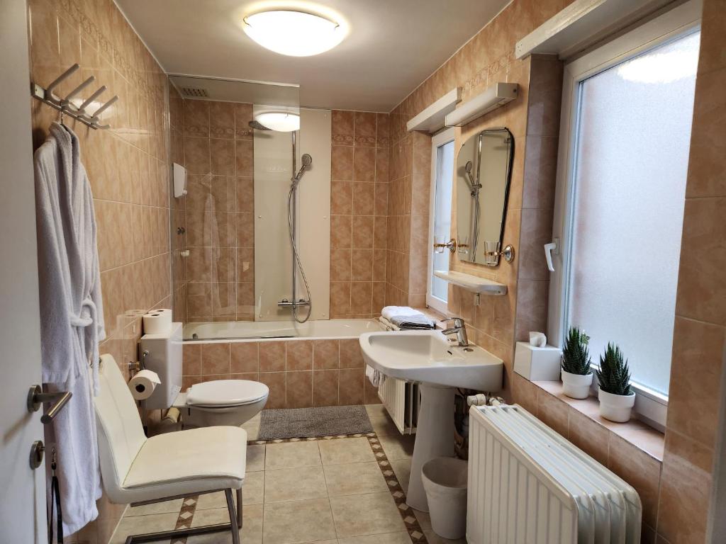 Koupelna v ubytování Albert - Rooms