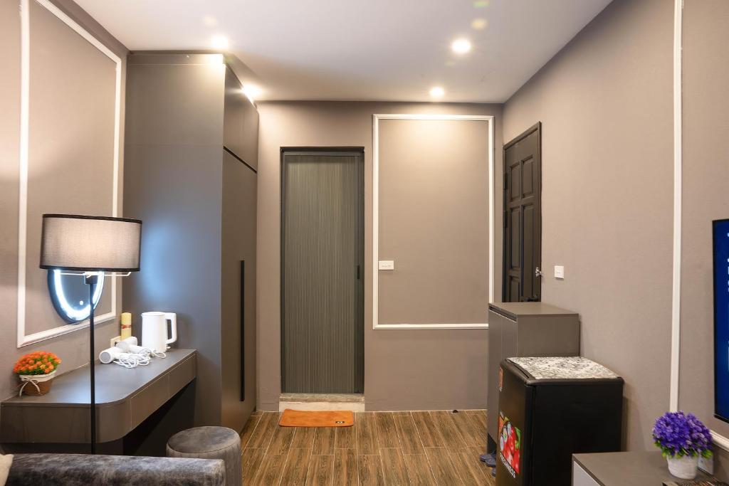 Postel nebo postele na pokoji v ubytování Spring Home Hà Nội