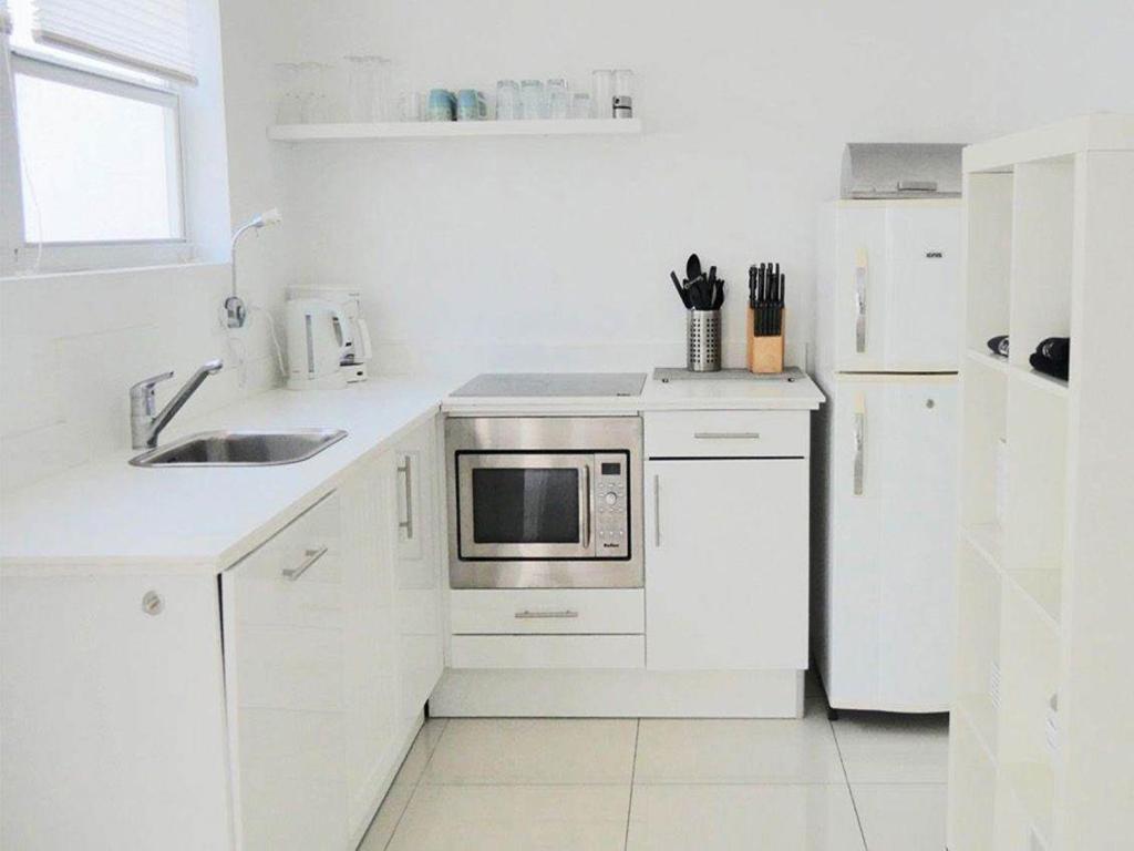 Kuchyň nebo kuchyňský kout v ubytování Appartement Chandon 4 pers
