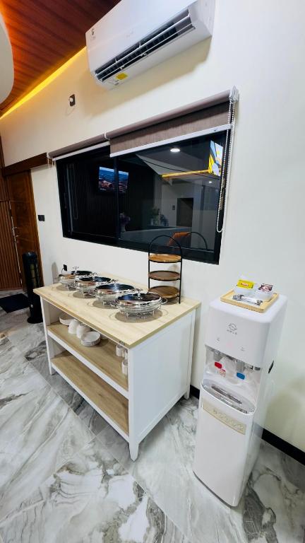 Eldhús eða eldhúskrókur á Camelia Guesthouse Syariah