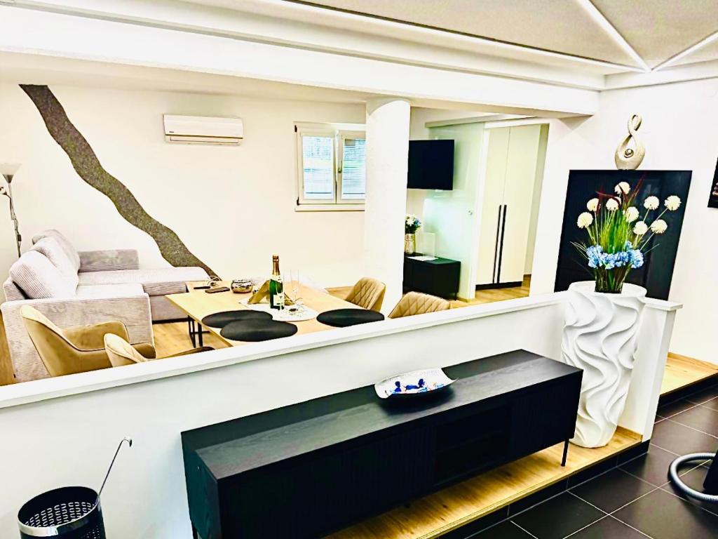 TV a/nebo společenská místnost v ubytování Ferienwohnung Wanderlust